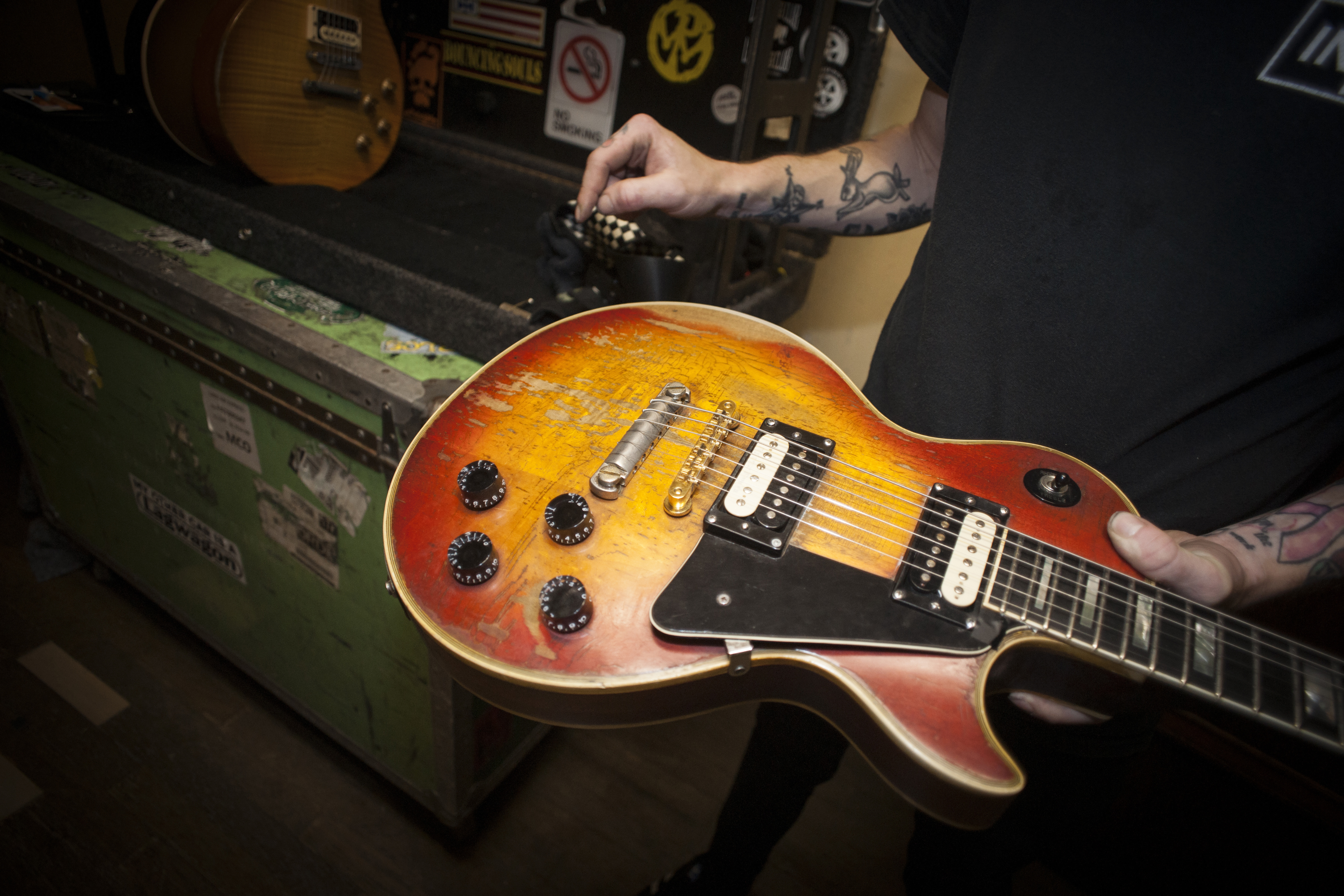 Zebra coil humbuckers in a road worn Les Paul with sunburst finish.