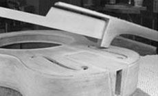 Flat fingerboard